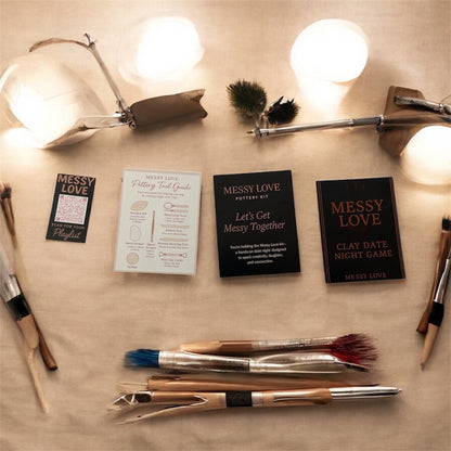 Clay art tools and guides on a wooden surface with warm lighting.